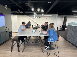 suretybonds.com customer care team huddle