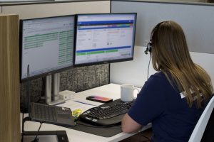 suretybonds.com transaction coordinator working at desk
